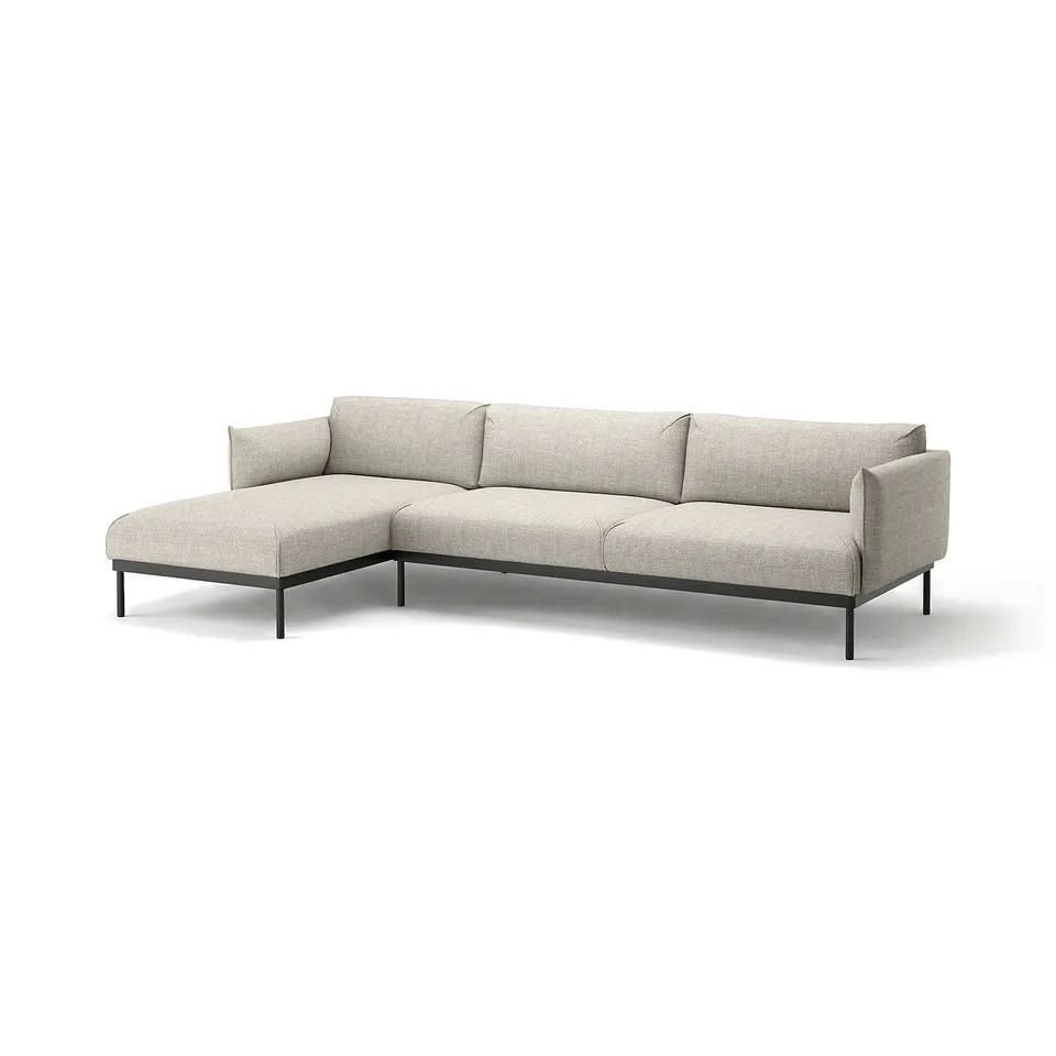 Modern light grey fabric l-shaped sofa with thin black legs.