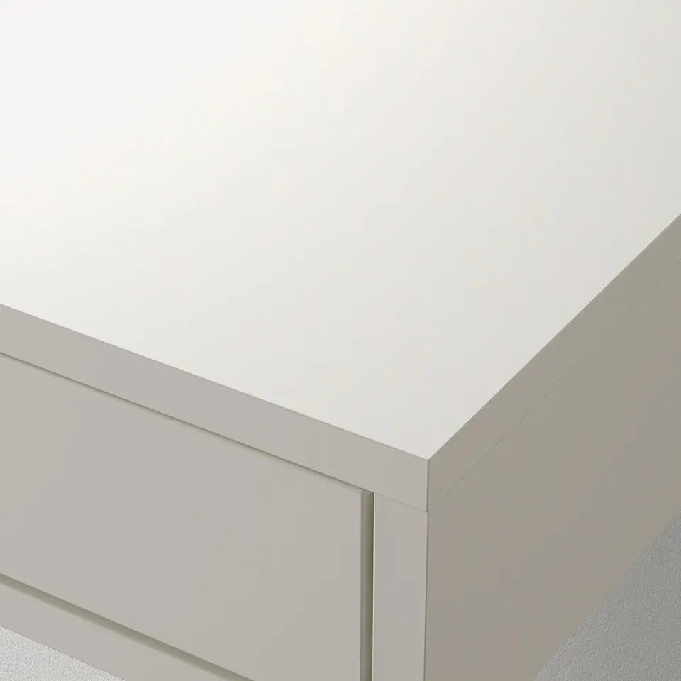 Clean, modern corner storage unit. White edges and sleek design, perfect for organised spaces.