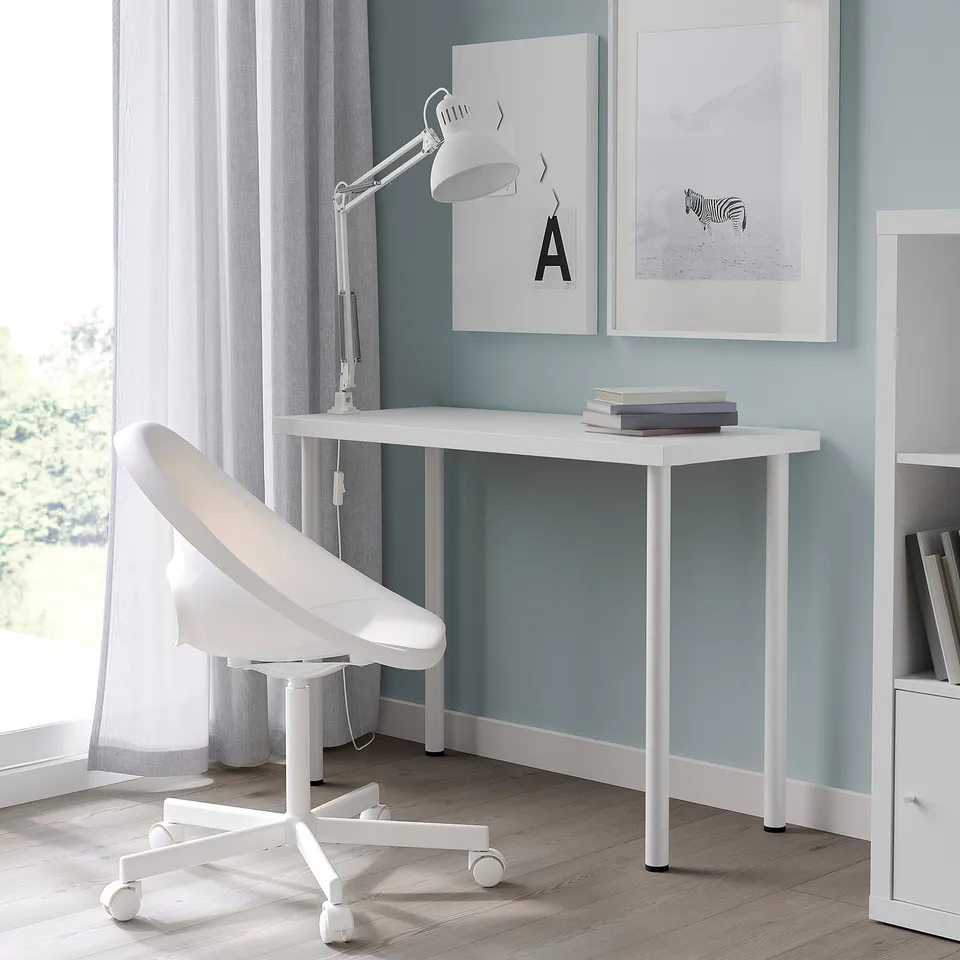 White LINNMON desk with chair. Modern, minimalist, compact for small spaces.