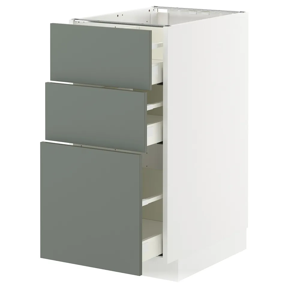 White METOD kitchen unit with 3 grey-green drawers.