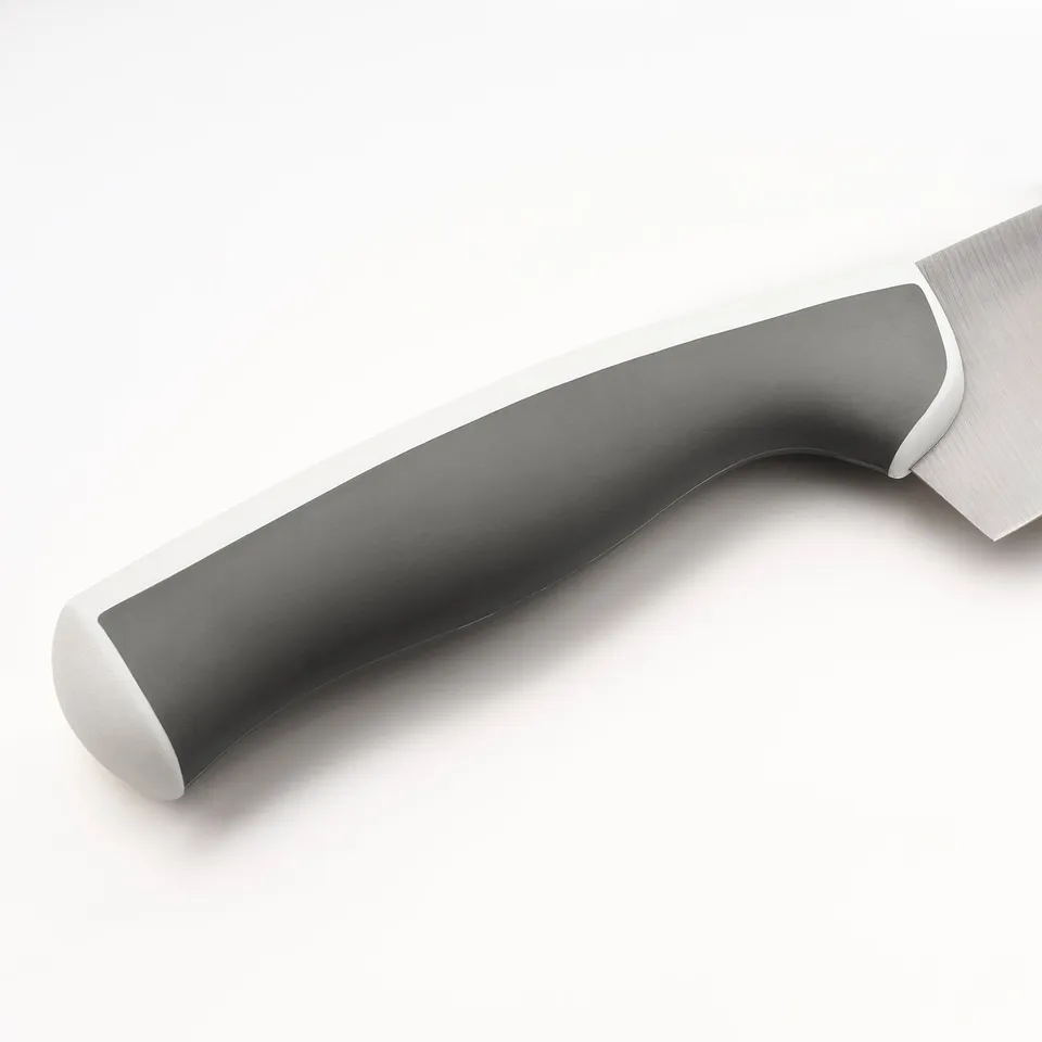 Close-up of modern kitchen knife handle, sleek grey grip, sturdy design.
