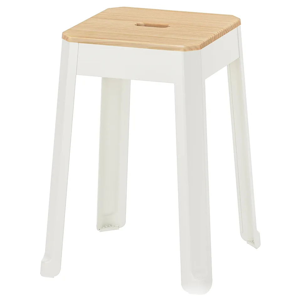 A TRÄNNÖ stool in white with a light wood seat, designed for versatility and durability.