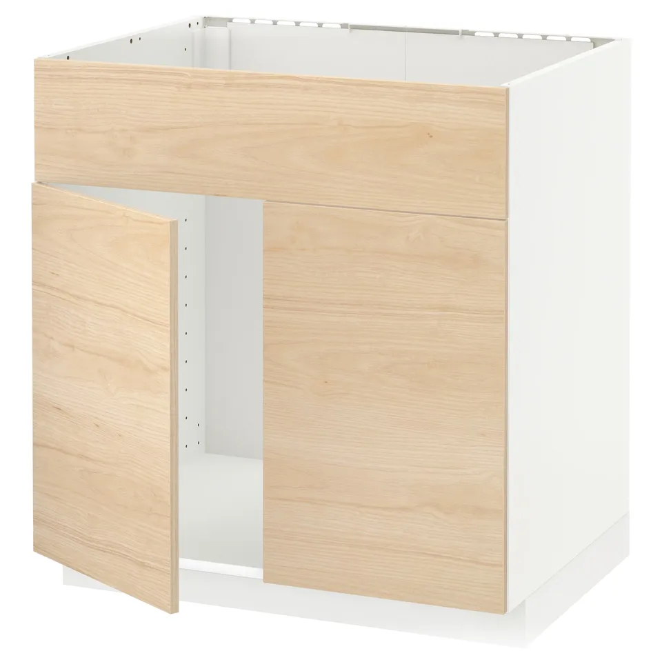 A METOD kitchen cabinet with light ash wood doors.