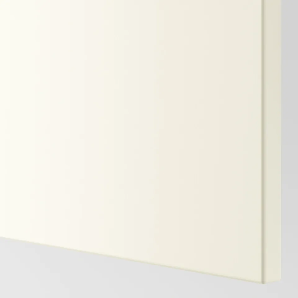 Golden-white cabinet corner, smooth finish, quality paint.