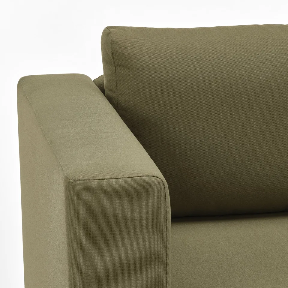 Olive green sofa with smooth, inviting fabric, showcasing modern design and quality upholstery.