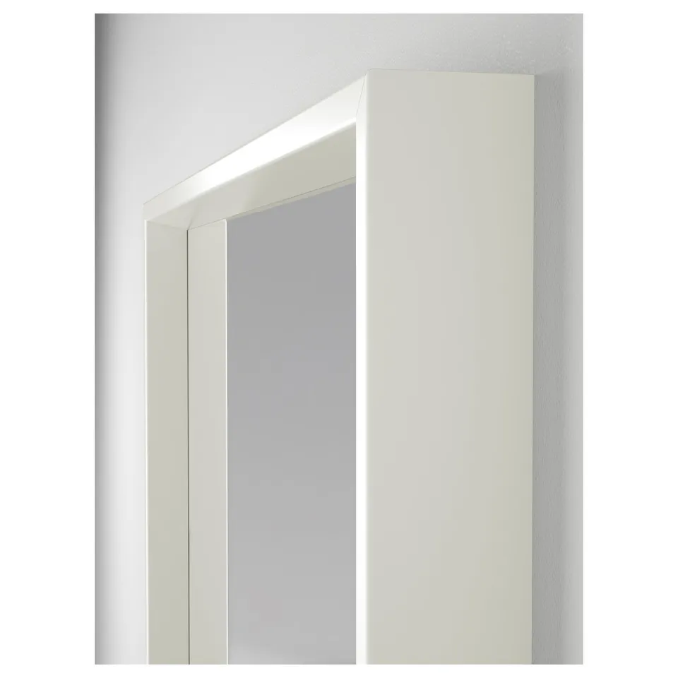 White-framed rectangular mirror with safety film, ideal for any room.