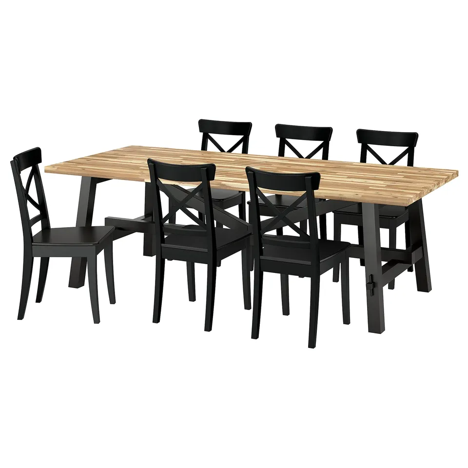 SKOGSTA dining set: rect. Table, 6 black chairs. Light brown top, metal legs. Chairs have crisscross backs, simple design.