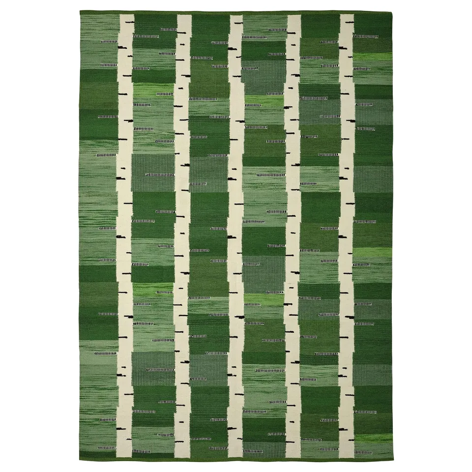 Handwoven green birch-pattern rug, made of cotton and wool, rectangular shape with double-sided design.