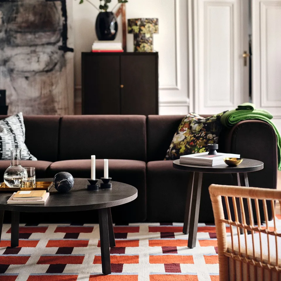 Living room with stockholm rug, reversible, complements sofa & table, cosy, durable.