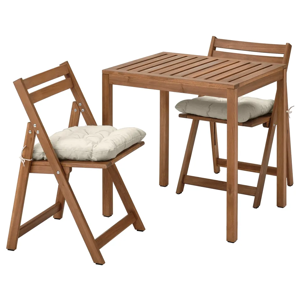 NÄMMARÖ Table and 2 folding chairs, outdoor, light brown stained/Kuddarna light grey-beige, 75x63 cm