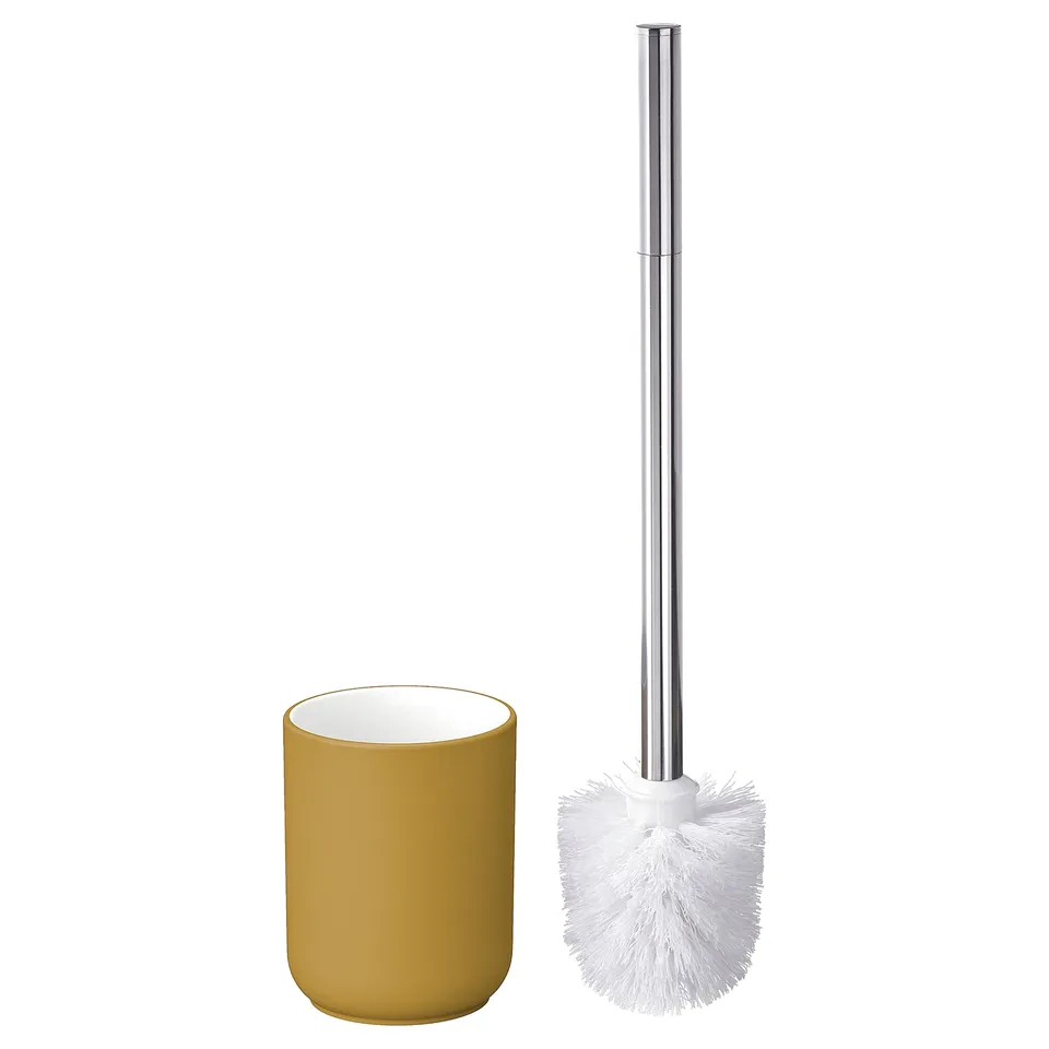 Yellow stoneware toilet brush holder with white brush.