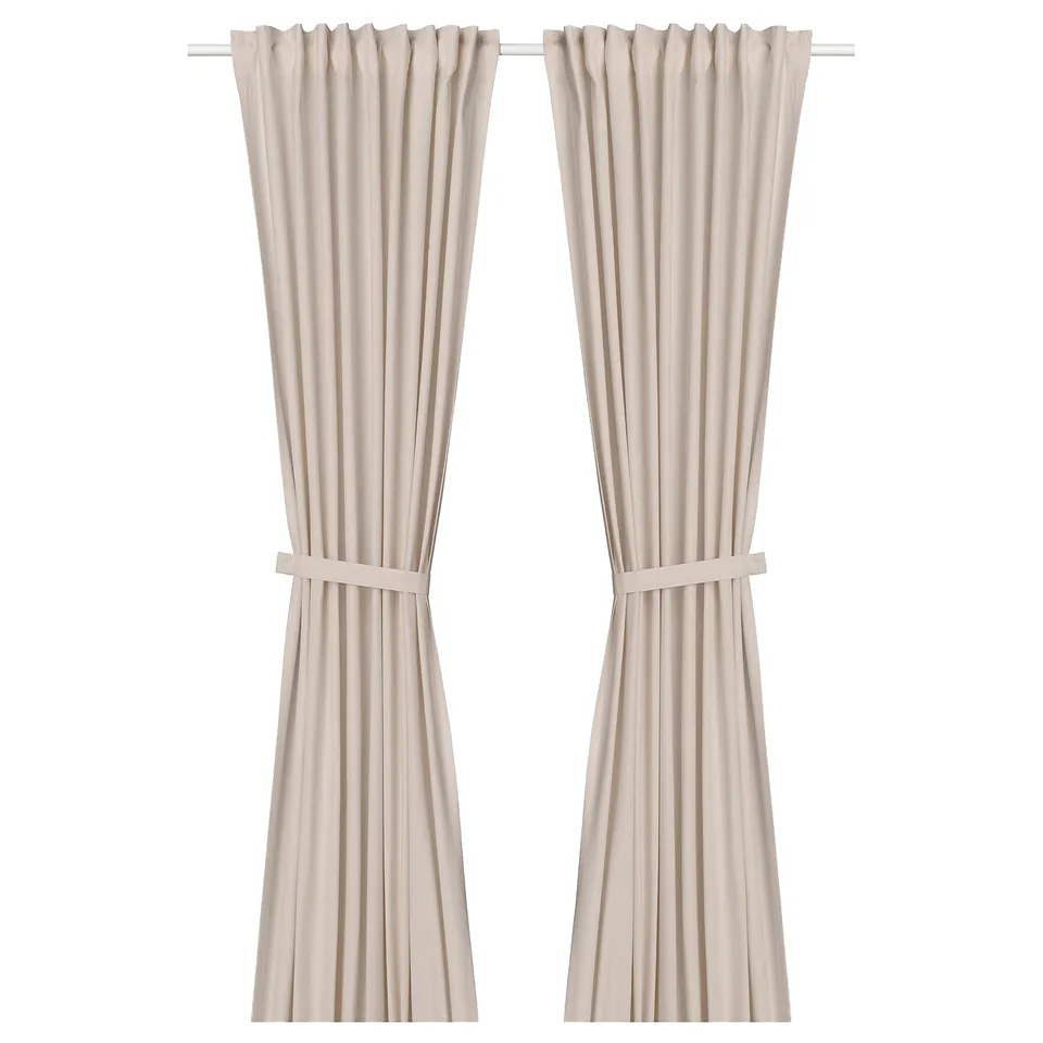 Light pink LENDA curtains, cotton with ribbed texture, tied back.
