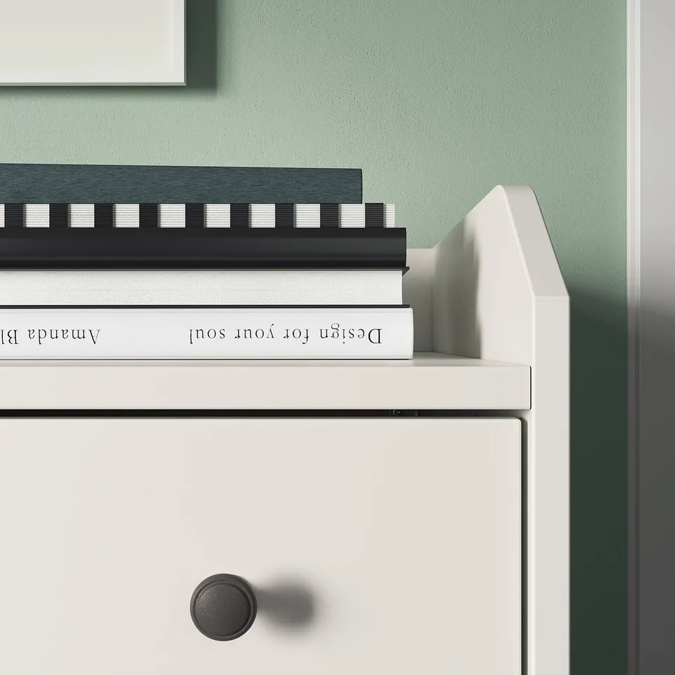 Minimalist white chest with 3 drawers, sleek knobs, and modern design for versatile home use.