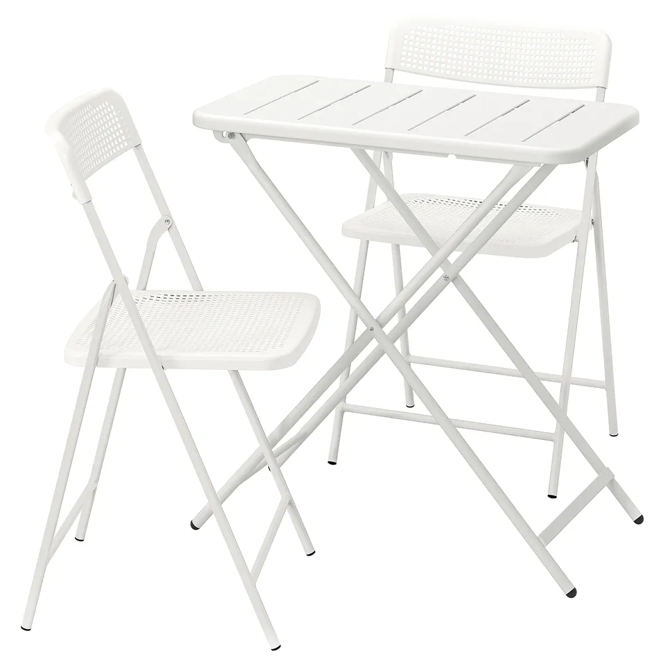 White TORPARÖ outdoor set: foldable, durable, easy-care, drained design, comfortable chairs.