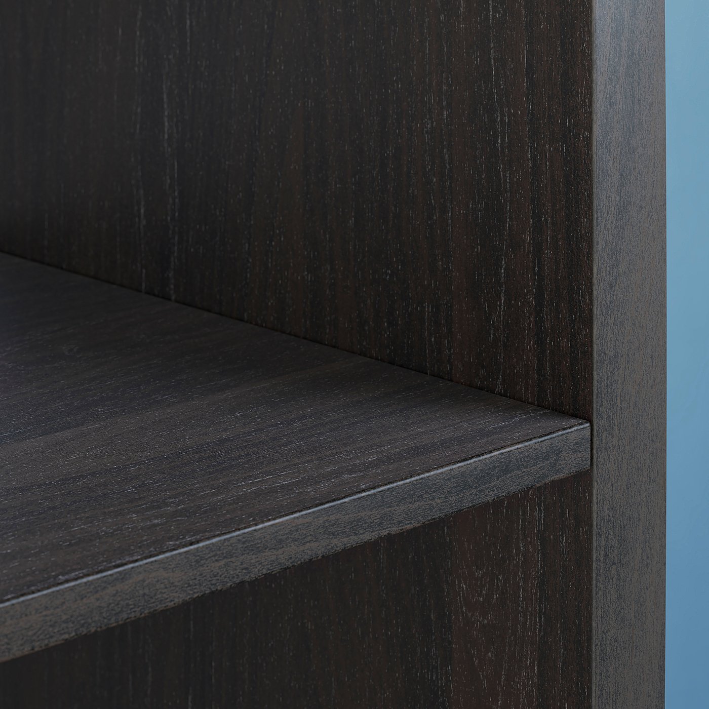 Dark wooden shelf with smooth, sleek finish, showing fine grain texture and sturdy construction.