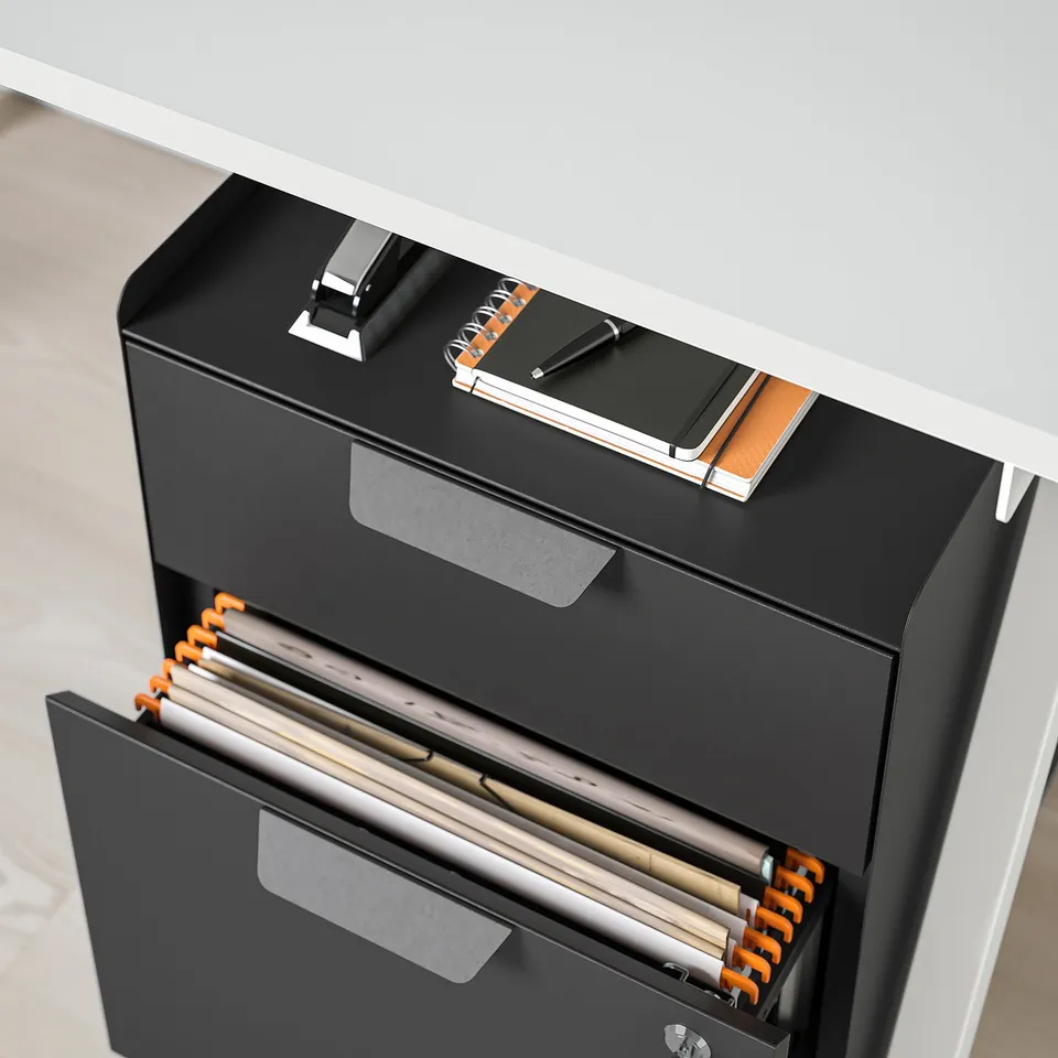 Black office storage unit with open drawer, showing files and divider.