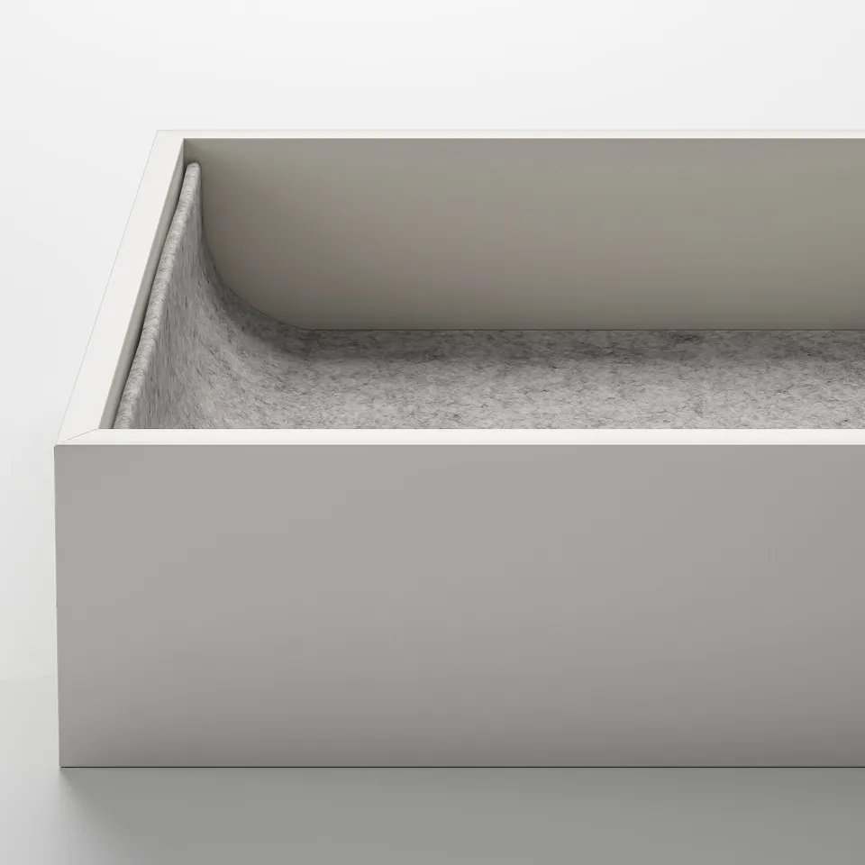 A sleek, modern pull-out tray with soft-close mechanism in a wardrobe organiser made of smooth, high-quality materials.