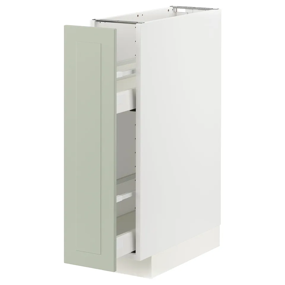 A METOD kitchen cabinet with green stensund fronts, featuring pull-out drawers and a modern design.