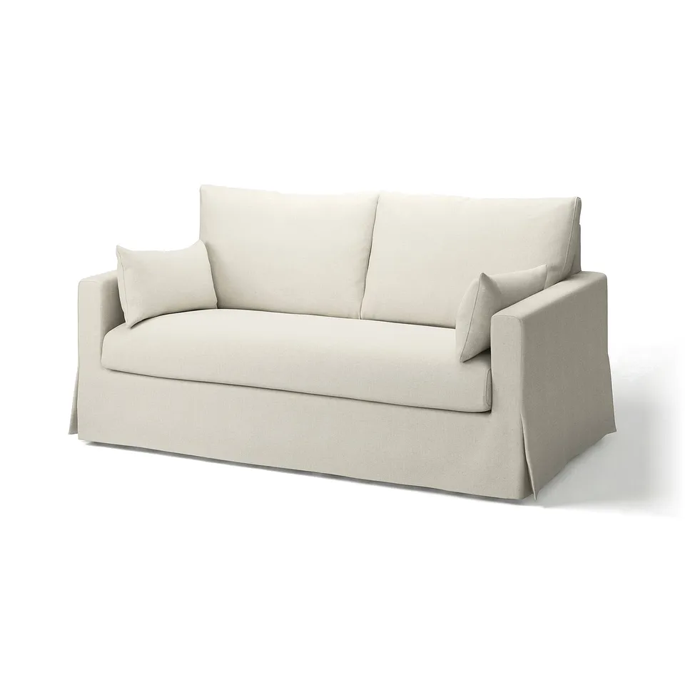 The HYLTARP sofa, light beige fabric, modern design with clean lines, comfortable and convertible.