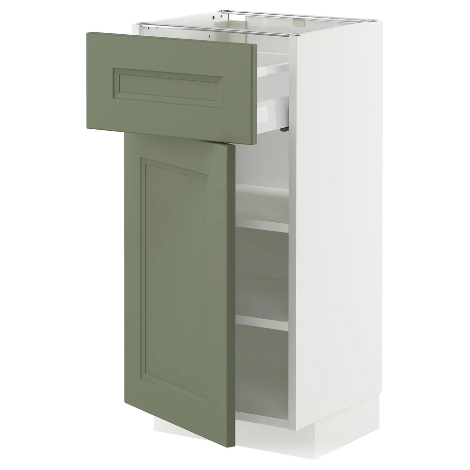 Green-white METOD kitchen cabinet with drawer and shelves, modern design.