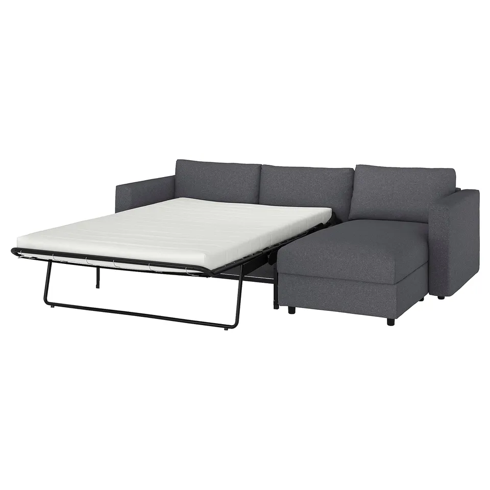Grey VIMLE sofa-bed, dark grey fabric, l-shaped with storage, convertible to bed.