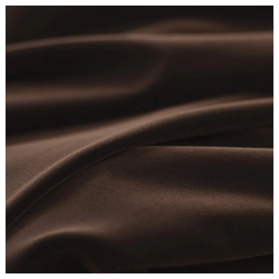 Close-up of luxurious, textured velvet with subtle sheen, showcasing high-quality material and intricate weave.