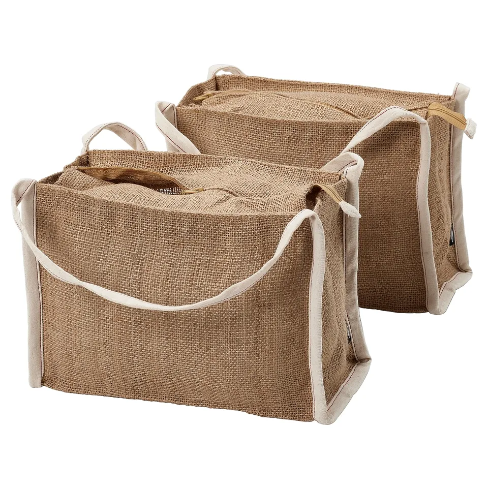 Three beige jute storage bags with handles, foldable, ideal for organising and storing root vegetables.