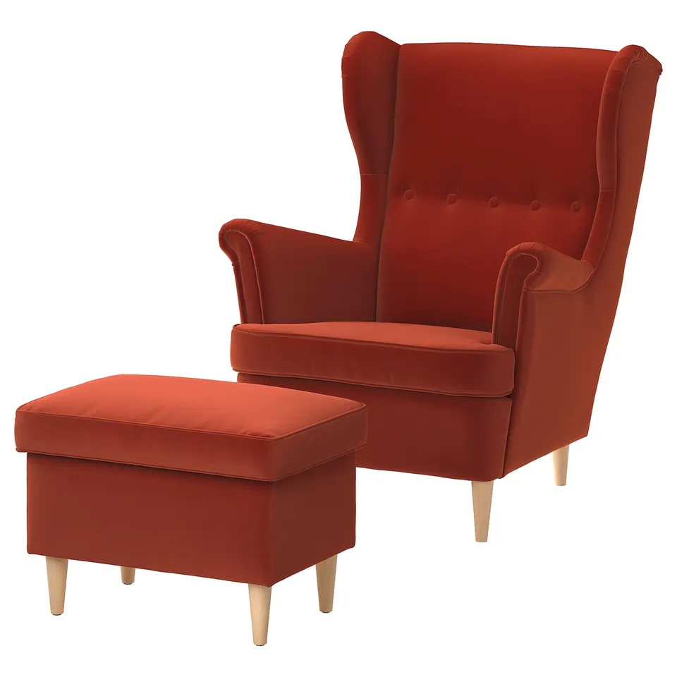 Bright red velvet wingback chair & ottoman, wooden legs.