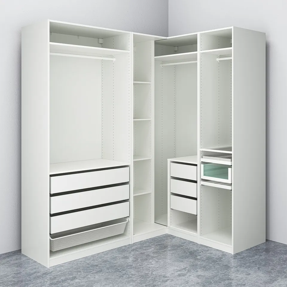 White corner wardrobe with drawers, mesh basket, shelves, and hanging space.