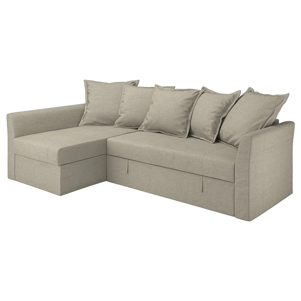 HOLMSUND beige corner sofa bed, clean-lined, with six cushions.