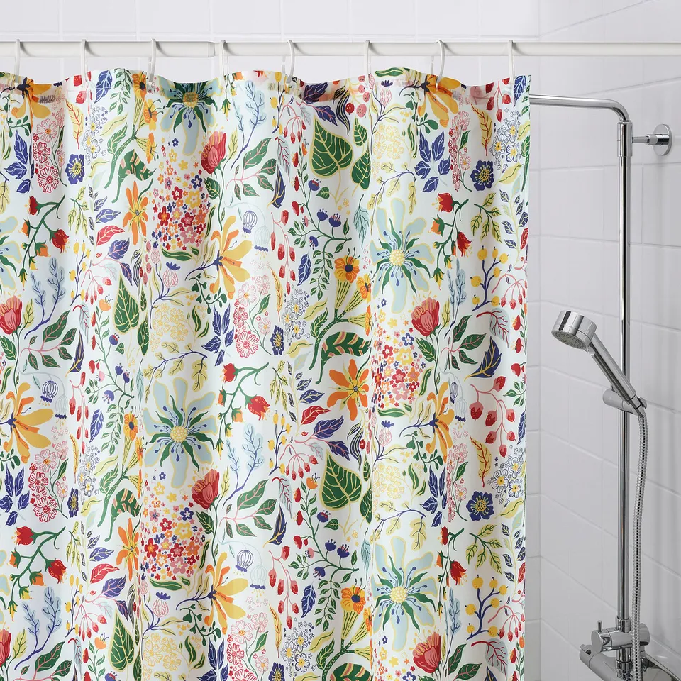 STRANDLUMMER shower curtain, white with colourful flowers, water-repellent polyester, large rectangle, fits standard bathrooms.