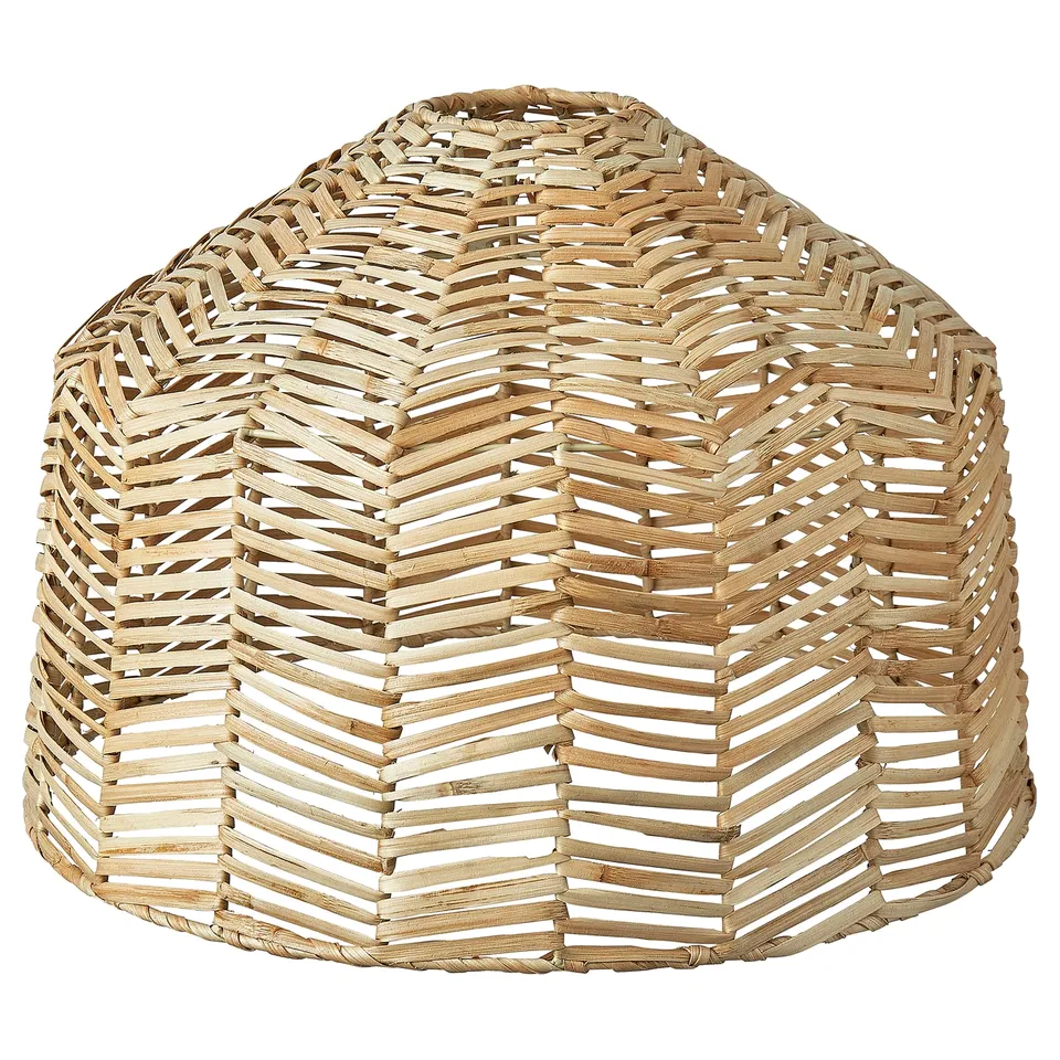 A KAPPELAND lamp shade made of hand-woven rattan with a herringbone pattern, designed by mikael axelsson for a warm, welcoming light.