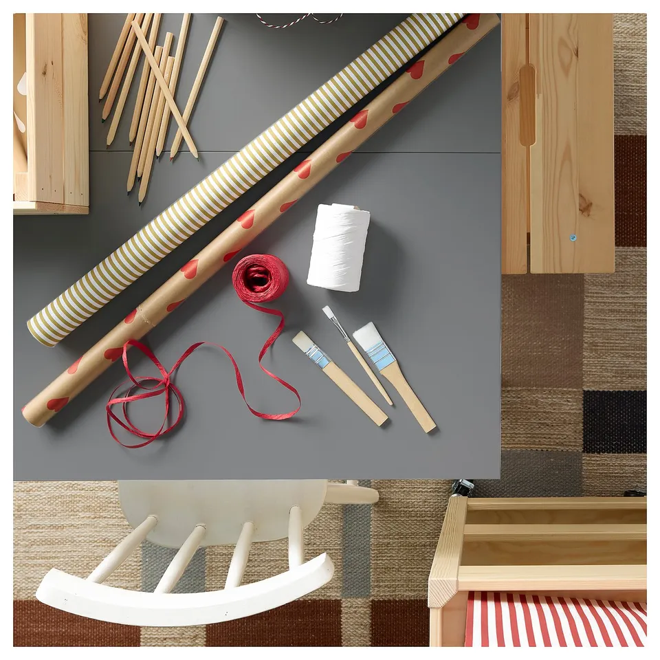 Flat-woven BLÅLJUS rug in muted tones, chequered design, handmade with wool and jute, rectangular shape.