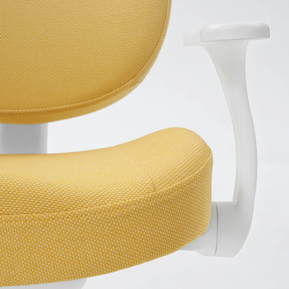 Close-up of modern chair: bright yellow cushioned seat and back, white adjustable armrests.