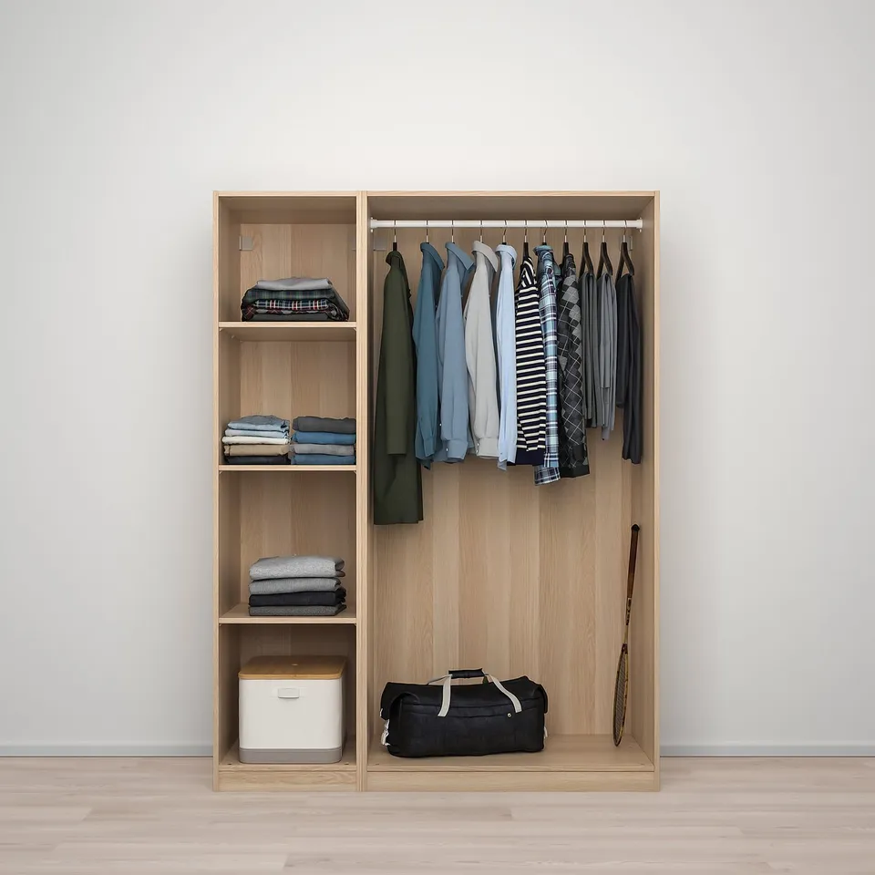 Wooden wardrobe with shelves for folded clothes and hanging rail for shirts.