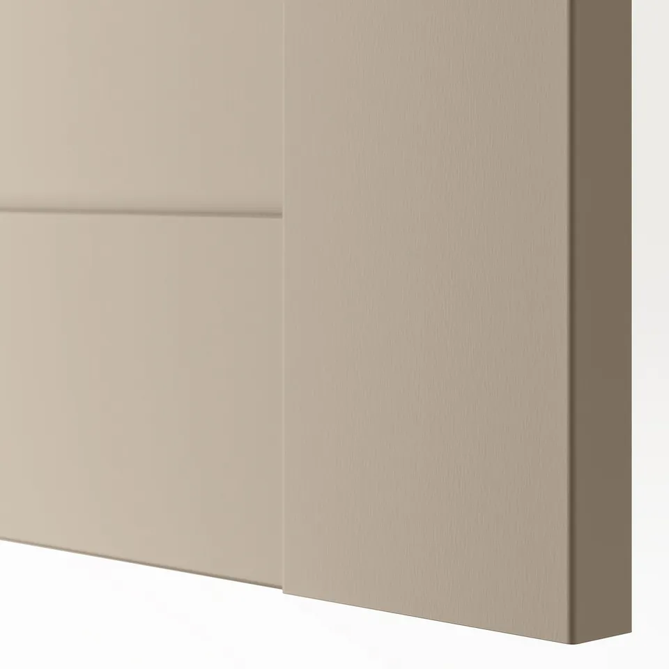 Semi-matte beige cabinet door with modern square design.
