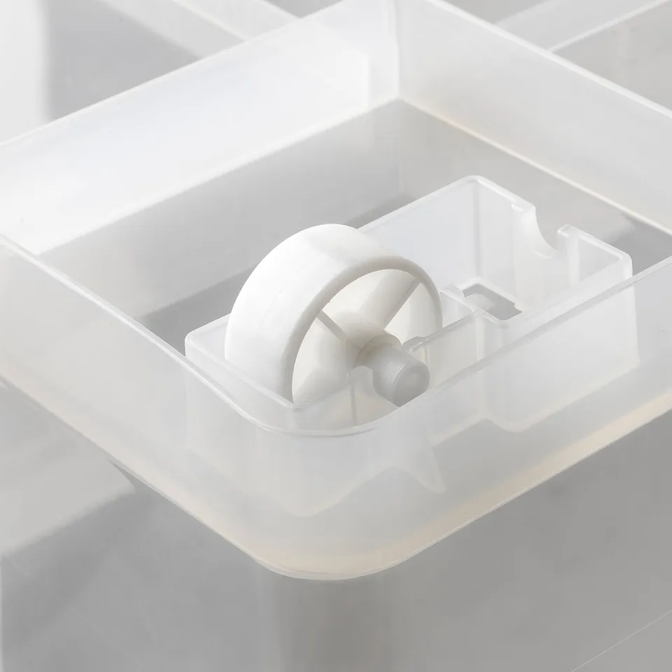 Wheel mechanism of a plastic storage box, well-designed for easy movement and durability.