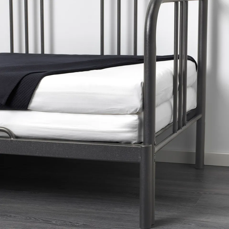 Day-bed with pull-out base, transforms from single to double.