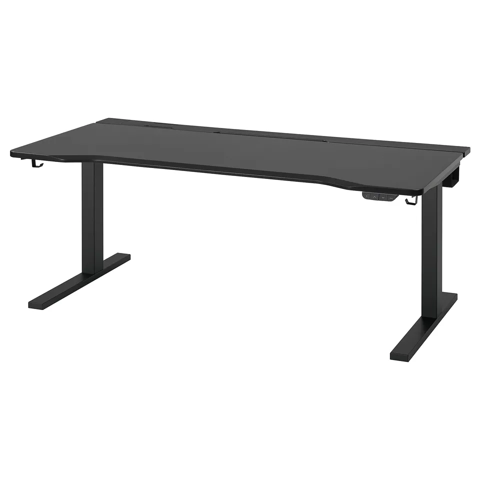 Black adjustable gaming desk with sleek design, electric height adjustment, and a spacious tabletop for multiple monitors.