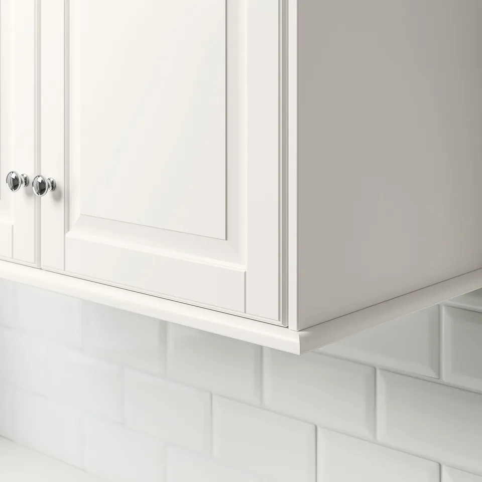 Kitchen cabinet moulding with chrome knobs