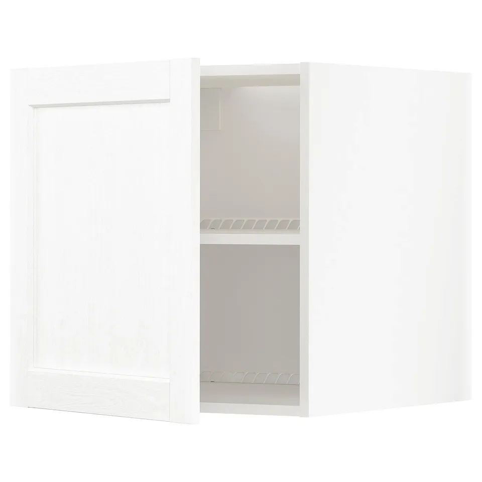 White kitchen cabinet with door open, showing two shelves inside. Modern design with subtle grain texture.