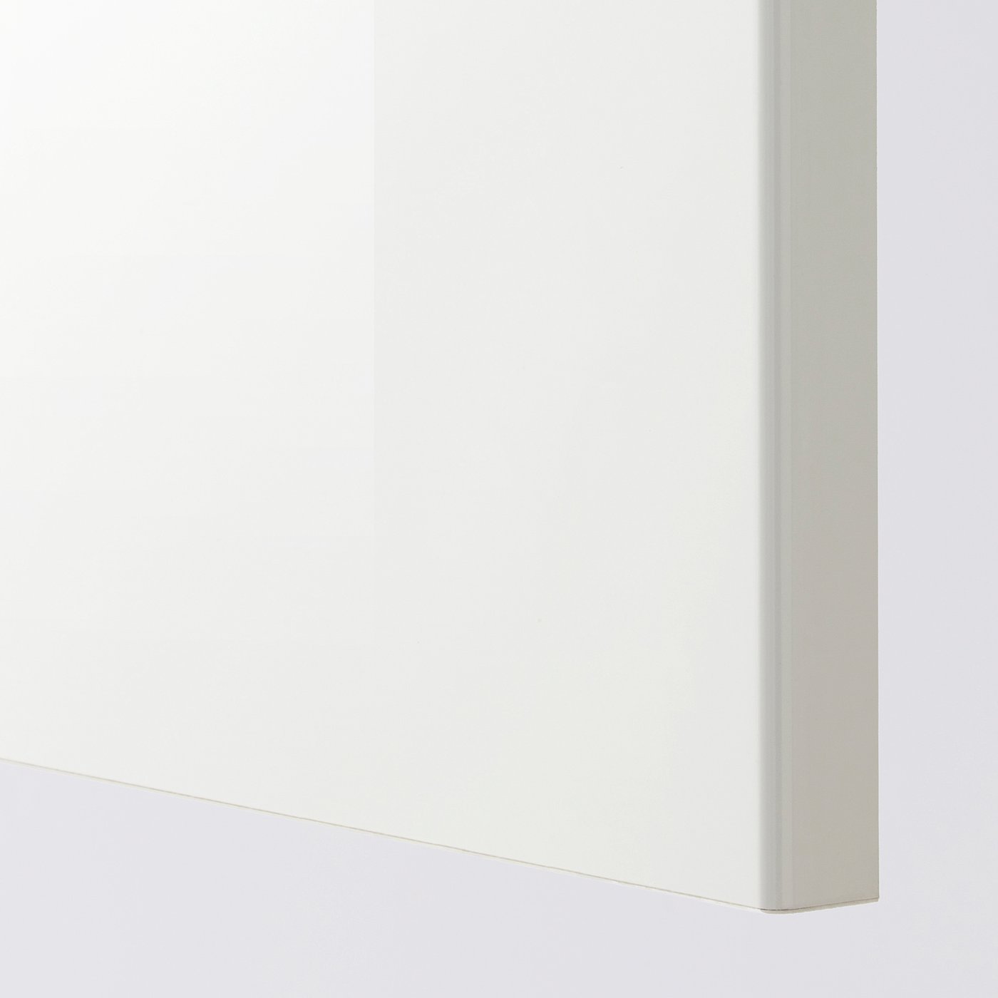 Clean, sleek white kitchen cabinet corner, showcasing modern design and quality finish.
