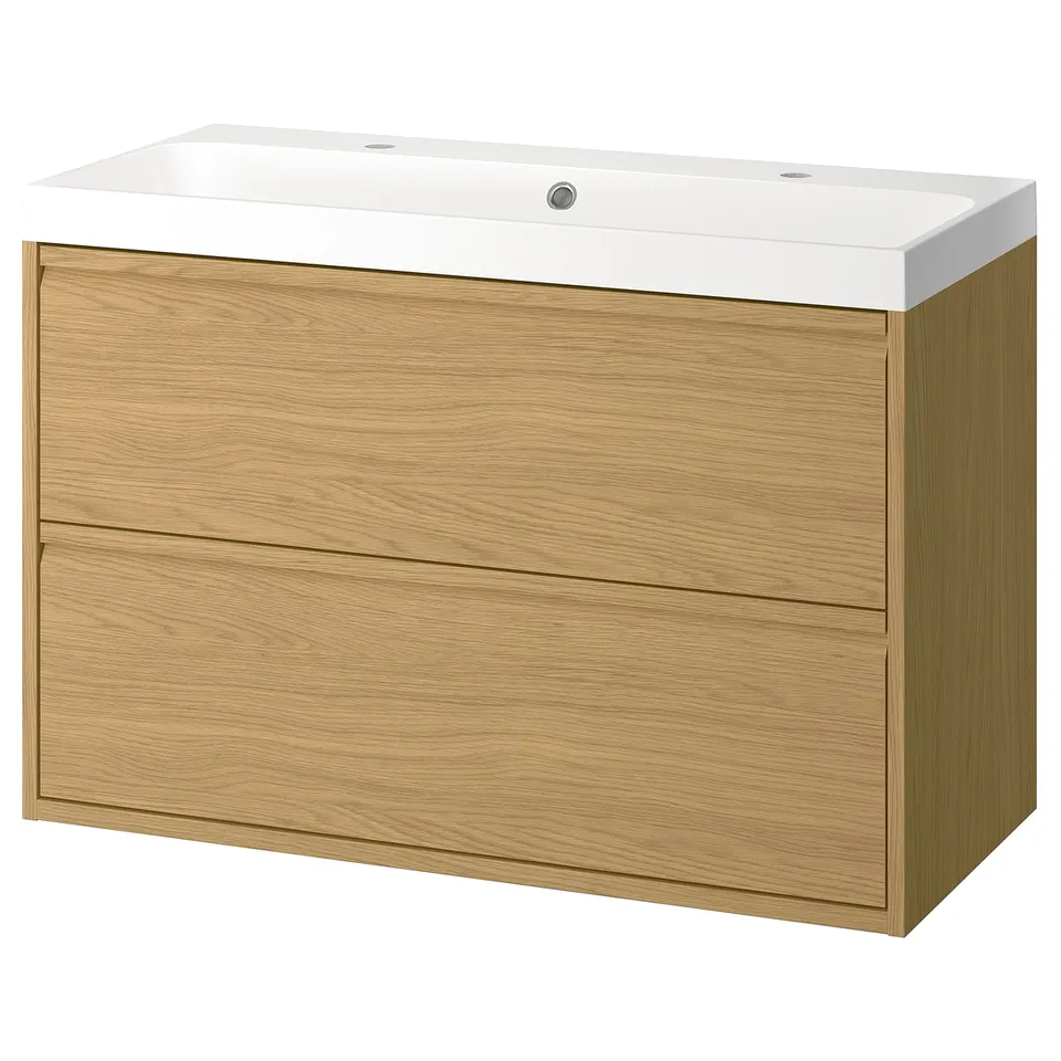 The ÄNGSJÖN light wood vanity two drawers, a sleek white sink, and simple modern design with minimal details.