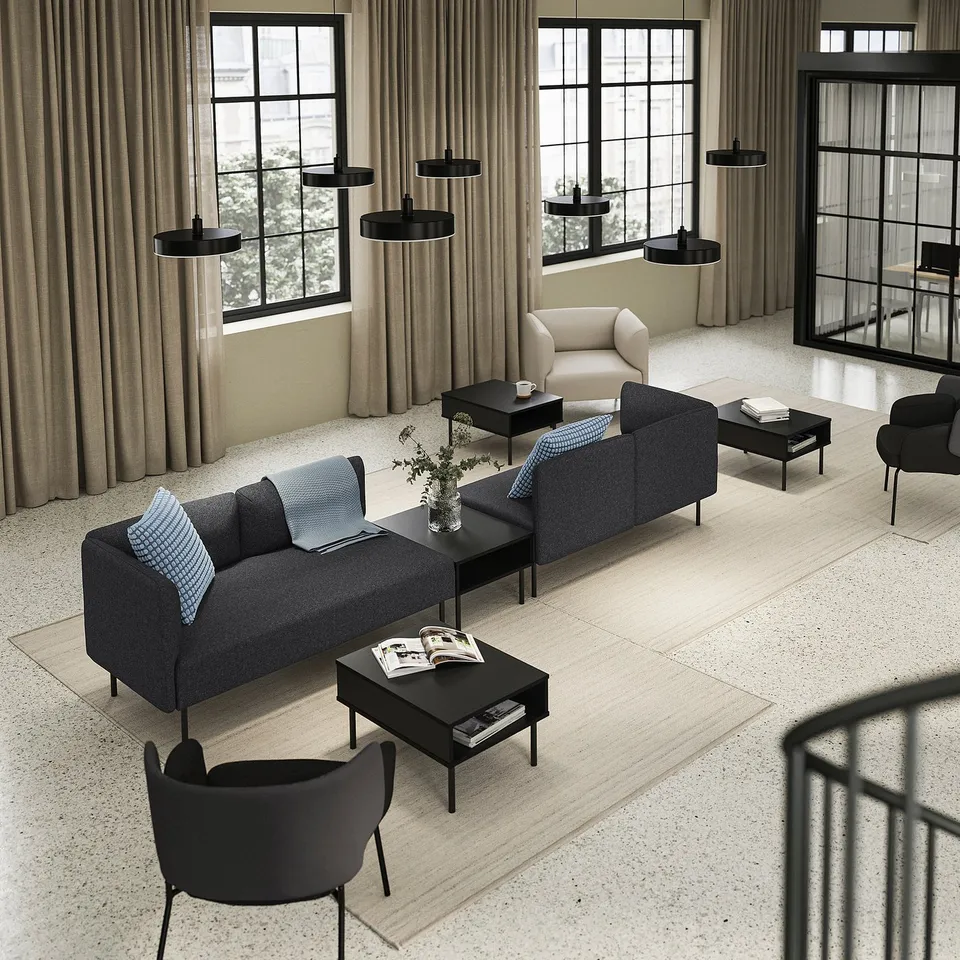 Modern living room: grey LILLEHEM sofa, black tables, trendy lights, large windows, beige curtains.