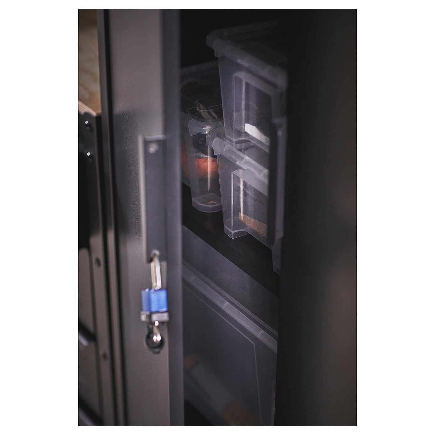 Black BROR cabinet, open door revealing clear plastic bins.