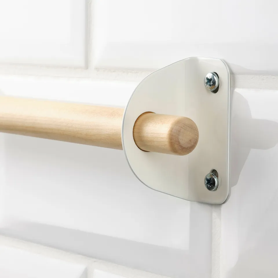 Close-up of sturdy, well-crafted wooden rail securely fastened with metal brackets, showcasing high-quality materials and precise design.