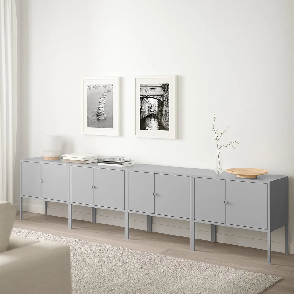 Grey LIXHULT 4-cabinet storage unit with tabletop, modern minimalist style.