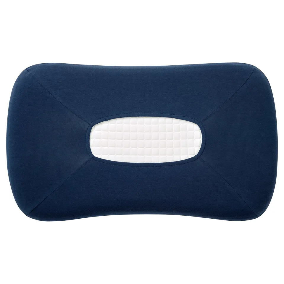 TÖCKENFLY navy blue ergonomic pillow with stretchy cotton cover.