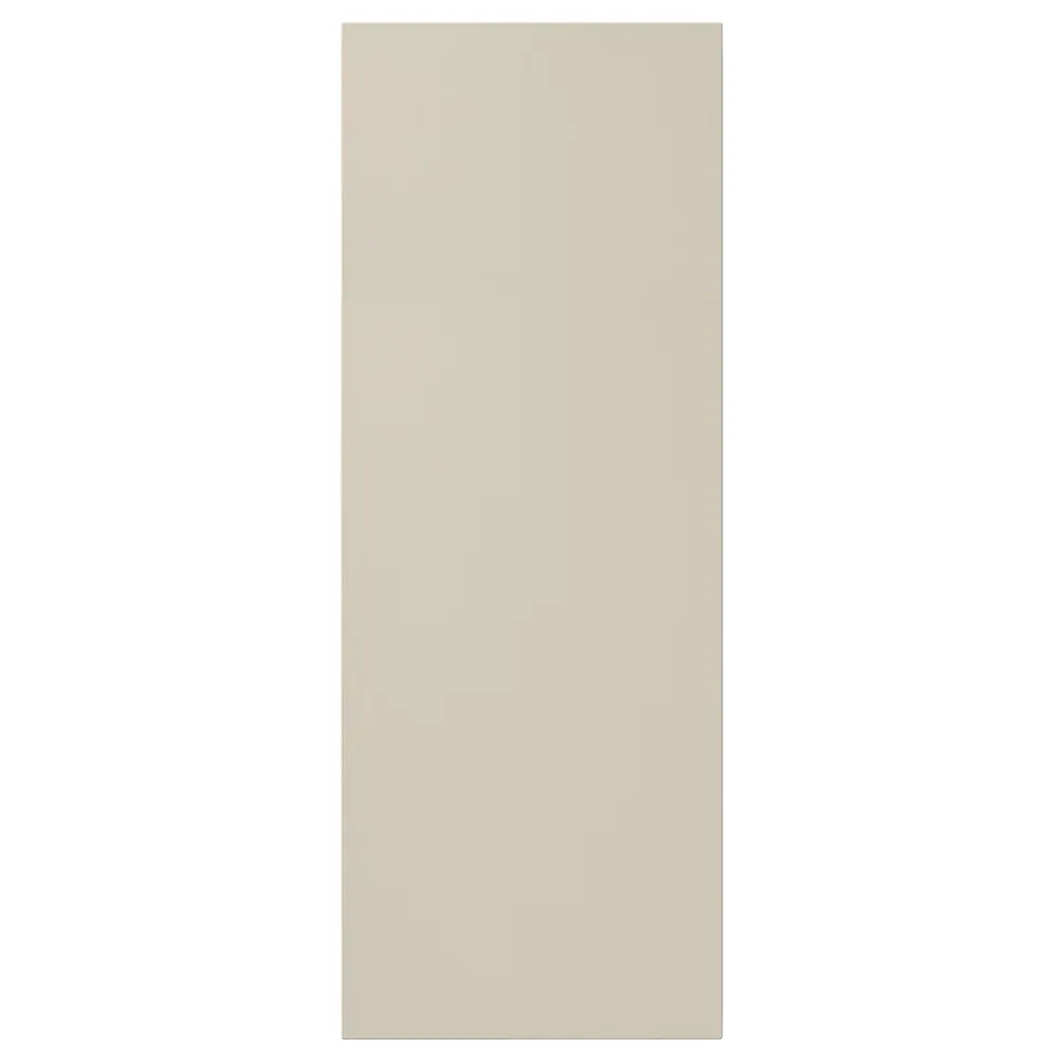 Beige HAVSTORP kitchen cabinet, smooth & modern, rectangular.