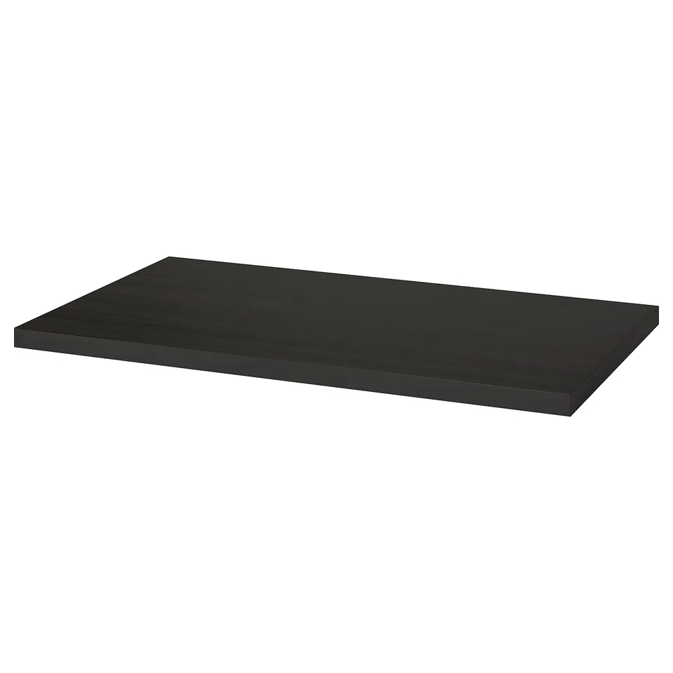 A black LINNMON table top, rectangular and flat, made from fibreboard and particleboard. It has a modern and sleek design.